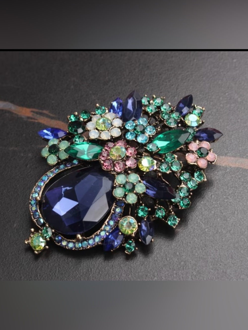 Multicolor Timeless Floral Brooch with Deep Blue Teardrop